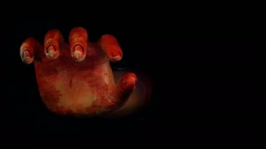 4K. bloody hand reach out from the dark space in halloween haunted night with horror film effect and horror effect