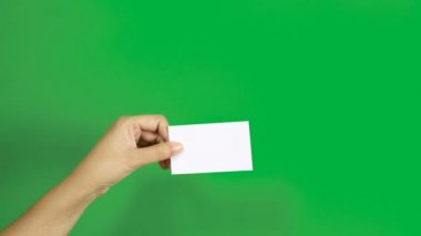 4K. set of woman hand showing blank white business name card paper in 3 different actions isolated on chroma key green screen
