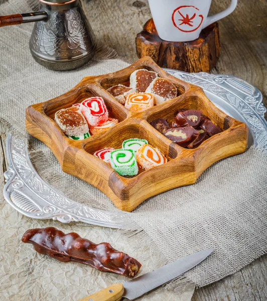 Assorted traditional oriental turkish delights on wooden background