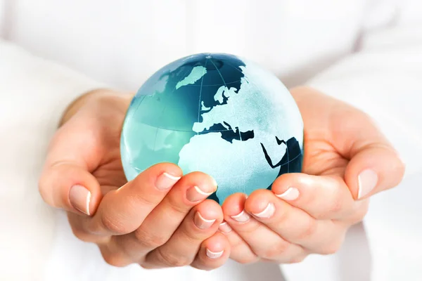 Hand holding blue earth — Stock Photo, Image
