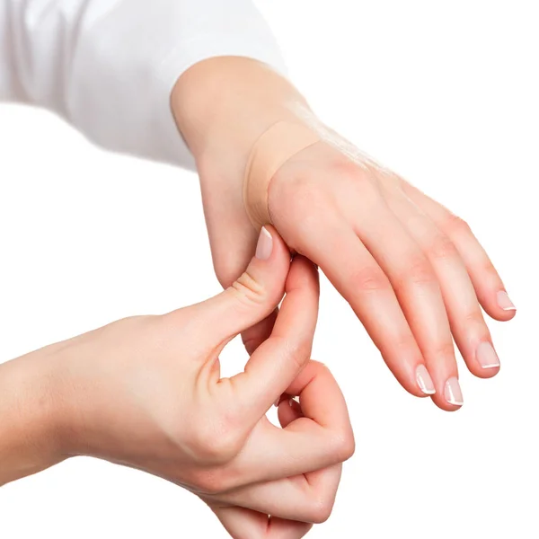 Putting plaster on hand — Stock Photo, Image