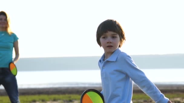 Happy Family Nature Mom Son Throw Ball Family Enjoys Sunset — Stock Video