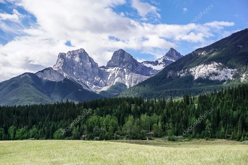A view of the Three Sisters Mountain looking up from the the trail in Canmore, Alberta Canada just on the outskirts of of Banff National Park.
