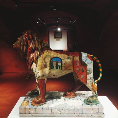 Lviv, Ukraine - August 20, 2018: Statue of the Lion in Lviv brewery museum. Beer Cultural Experience Center Lvivarnya. Museum complex of brewing history. The lion is symbol of Lviv city clipart