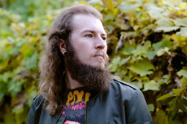 Portrait of handsome bearded man in sunlight — Stock Photo, Image