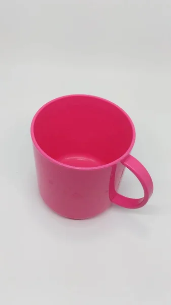 Child Pink Plastic Cup — стоковое фото