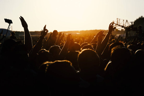 Audience At Outdoor Music Festival, sunset