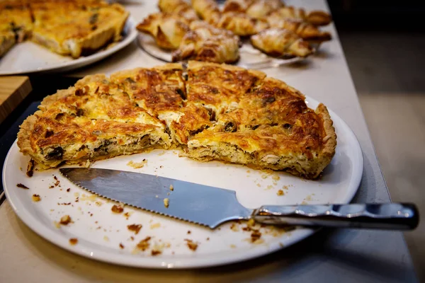 Sliced pie stuffed with meat and chicken