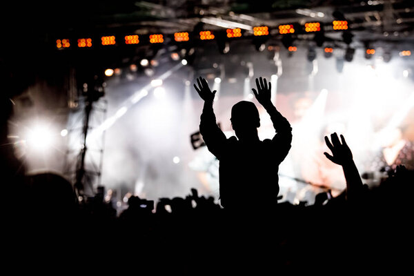 Silhouette of crowd concert, music fans on show