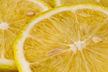 Limon arka planı. Limon dilimlerinin yakın görüntüsü. Citrus dokusu