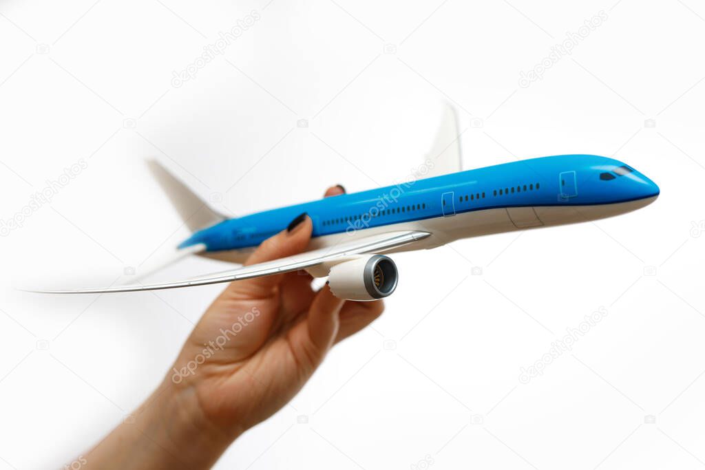 Aircraft model in female hands