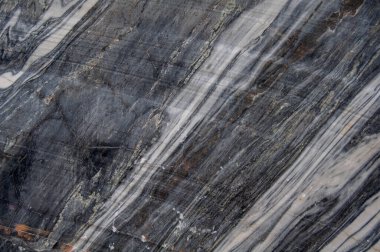 Geçmişi. Terk edilmiş eski bir taş ocağının mermer duvarı. Doku.