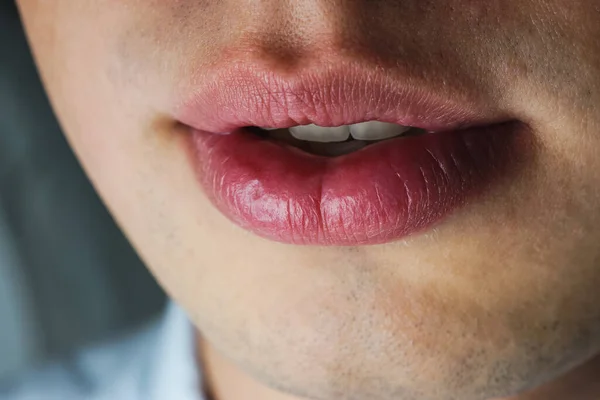 natural big lips men close up