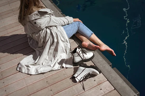 Girl White Shoes Sits Pier Yacht Club Reads Newspaper Has — Stock Photo, Image