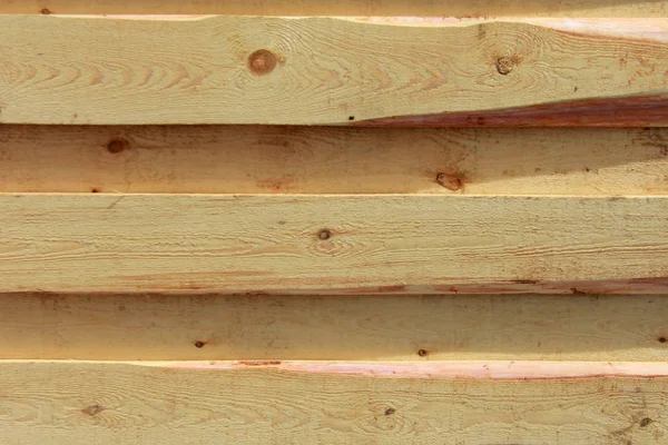 Textura de fondo. Nueva pared de madera ligera hecha de tablas — Foto de Stock