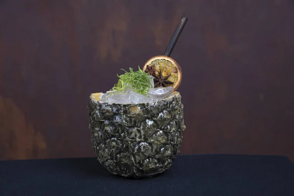 pineapple cocktail with dried lemon