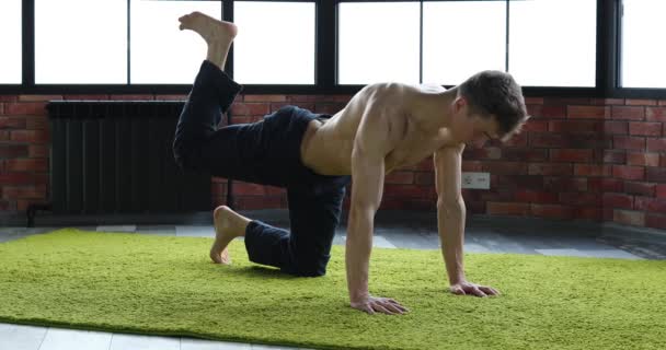 Young Man Engaged Oriental Practices Yoga Strengthen Young Health — Stock Video