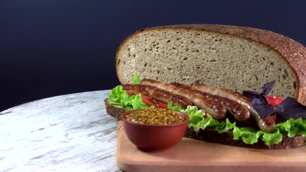 Sandwich from the traditional Ukrainian eco bread lost to taste without flavors, fillers and GMOs. Baked in the oven on the wood of fruit trees. — Stock Footage Sandwich Traditional Ukrainian Eco Bread Lost Taste Flavors Fillers Gmos Stock Video