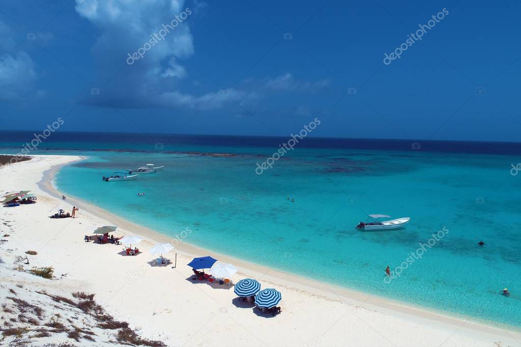 Caribbean sea, Los Roques. Vacation in the blue sea and deserted islands. Peace and a dream. Fantastic landscape. Paradisiac beaches. Travel, vacation, tranquility. Tropical travel. Travel destinaton. Vacation  travel. Great beach scene.