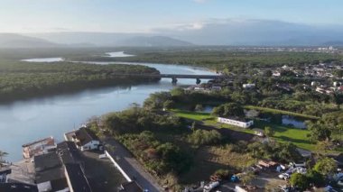 Sunset River At Itanhaem In Sao Paulo Brazil. Atlantic Forest Landscape. River Skyline. Tropical Travel. Sunset River At Itanhaem In Sao Paulo Brazil. Outdoor Sunset.