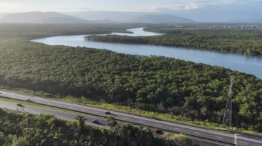 Sunset River At Itanhaem In Sao Paulo Brazil. Atlantic Forest Landscape. River Skyline. Tropical Travel. Sunset River At Itanhaem In Sao Paulo Brazil. Outdoor Sunset.