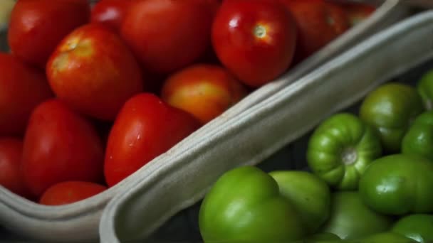 4k Tomatoes and Green Tomatillos in Baskets — Stok Video