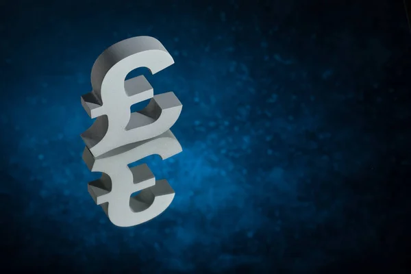 British Currency Symbol or Sign With Mirror Reflection on Blue Dusty Background — Stock Photo, Image