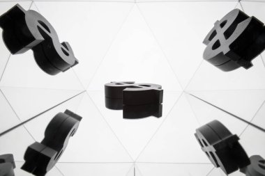 Kendisi birçok yansıtma görüntülerini Doları para birimi simgesiyle