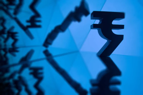 Indian Rupee Currency Symbol With Many Mirroring Images of Itself