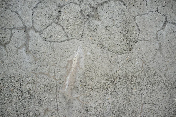 Textura de parede de concreto exposto a mau tempo por muito tempo — Fotografia de Stock