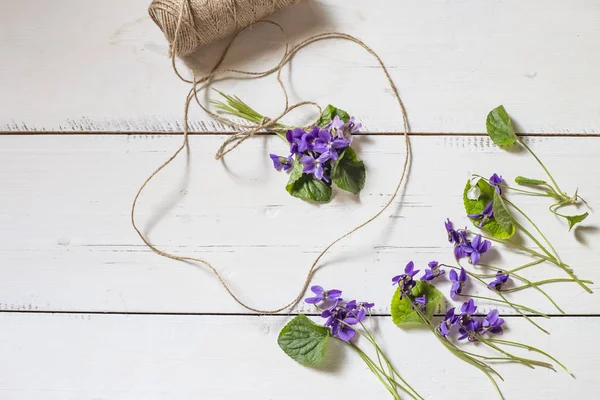 Bunch Violets Wooden White Background — Stock Photo, Image