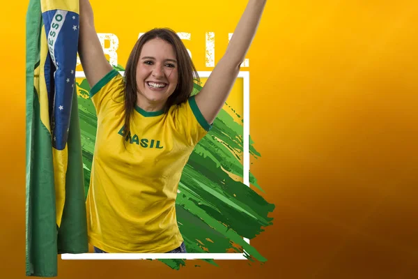 Brazilian woman fan, celebrating on a yellow background with copy space.