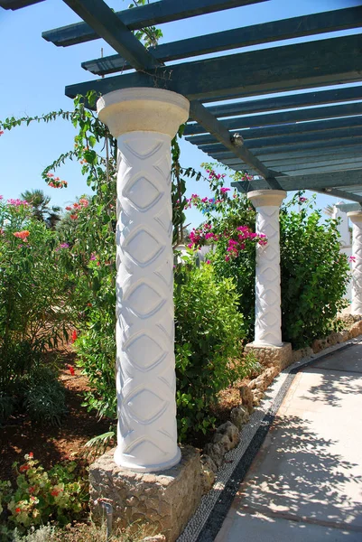 Close-up of a white canopy column over the road, Kallithea, Rhodes Island, Greece