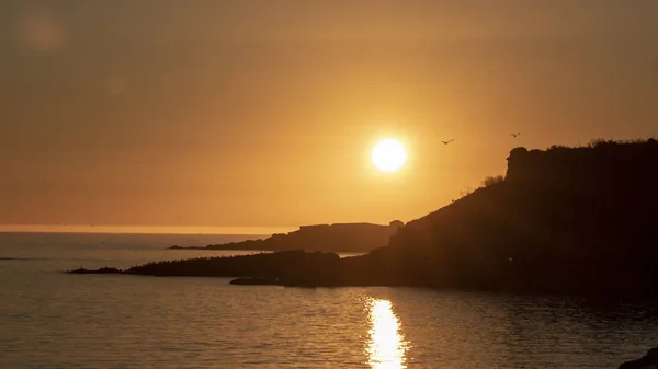 Захід сонця з порту Камарі. — стокове фото