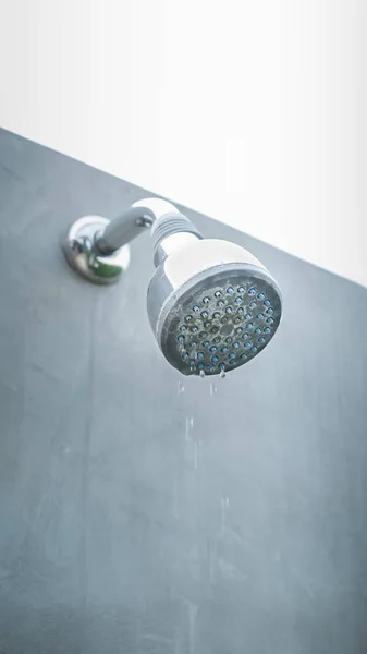 Water drop and dirty shower head is in outdoor shower point