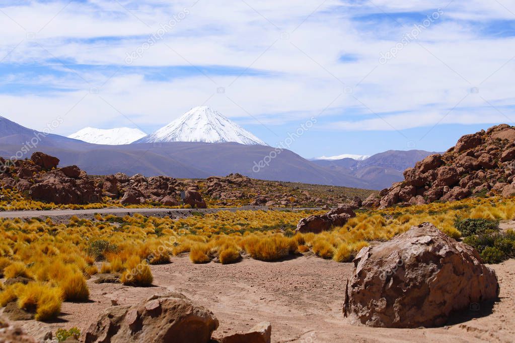 Landscapes of the Atacama Desert: view of Licancabur volcano along the road to the El Tatio geysers near the Termas de Puritama, Atacama Desert, Chile