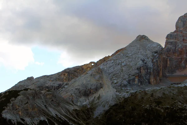 The Occhio di Dio (Eye of God) a particular rock form, a hole of considerable size, dug into the rock of Croda Rossa d\'Ampezzo (Hohe Gaisl), Dolomites, Italy