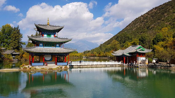 Temple or pavilion in Black Dragon Pool in Jade Spring Park, Lijiang, Yunnan, China. It was built in 1737 during the Qing dynasty