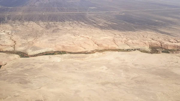 View of a river that crosses the Atacama desert from the airplane, Chile