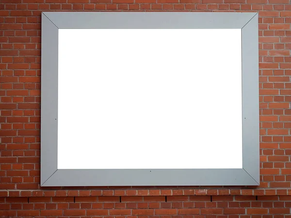 Jelzőtábla üres fehér modell akár indítótárcsa-ban egy szürke keret, a régi város fal háttér bemutatás belső billboard nézete . — Stock Fotó