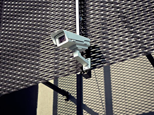 City, police monitoring, video camera recorder, CCTV, protecting and observing people,
