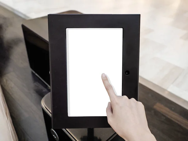 A woman using touch screen mock up of kiosk digital stand, for ads, marketing advertising, design, promotion in the shopping centre, gallery, convention centre, events.