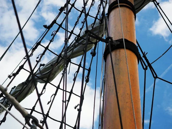 Rigging of the old pirate sailing ship, boat, mast, blue sky, yacht