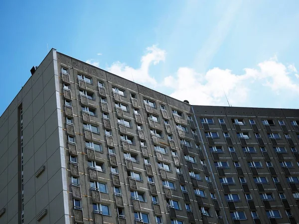 An old, sad, socialism, poor, overwhelming communist block with a blue sky — Stock Photo, Image