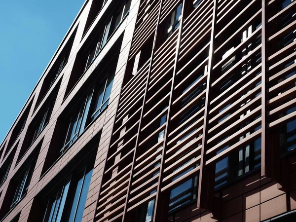 Wooden batten facade of a front of modern building, office, hotel condominium. — Stock Photo, Image