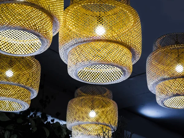 Asian classic interior decoration style bamboo weave pattern lamp, Element of decoration of the lamp with bamboo netting with curls hanging on ceiling.