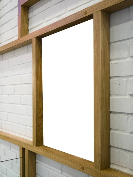 Wooden modern frame on a wall. Panel for poster, information board.