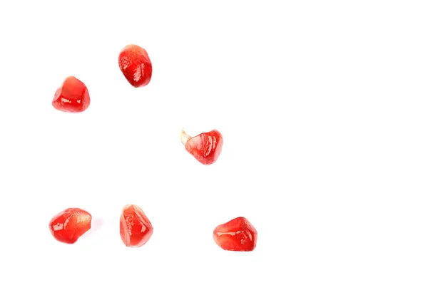 Pomegranate grains isolated on white background — Stock Photo, Image