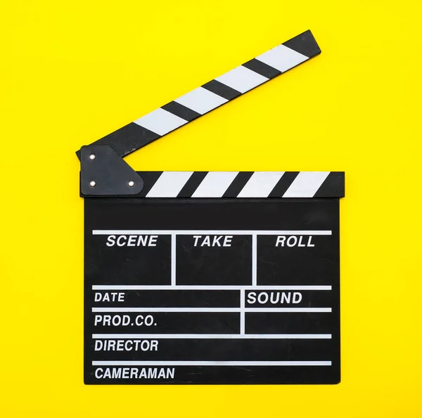  Film clapper sarı bir arka plan üzerinde