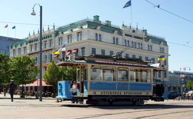 Old tram at street in Gothenburg, Sweden clipart